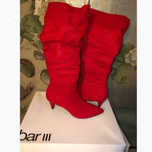 Red knee high boots